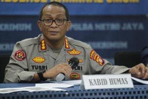 polda-metro-jaya-tangkap-pemuda-yang-ancam-penggal-polisi-lantaran-tangkap-habib-rizieq-ixe.jpg